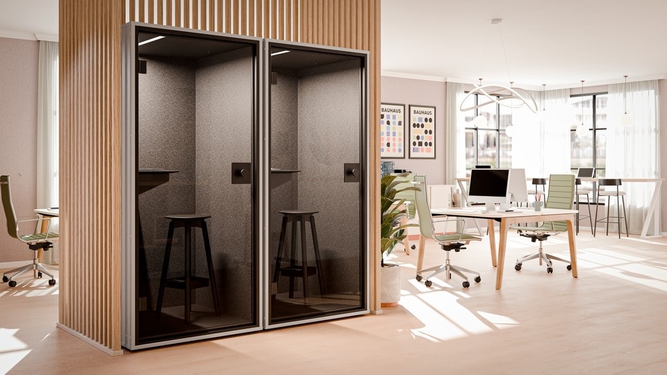 Deux cabines acoustiques BERLIN FOCUS côte à côte dans une alcôve en tasseaux de bois, illustrant l'intégration du design Bauhaus en open space.
