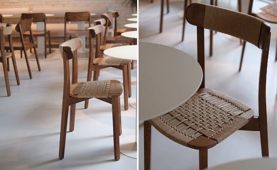 Chaise en bois foncé avec détail des finitions en corde, donnant un aspect authentique et artisanal.