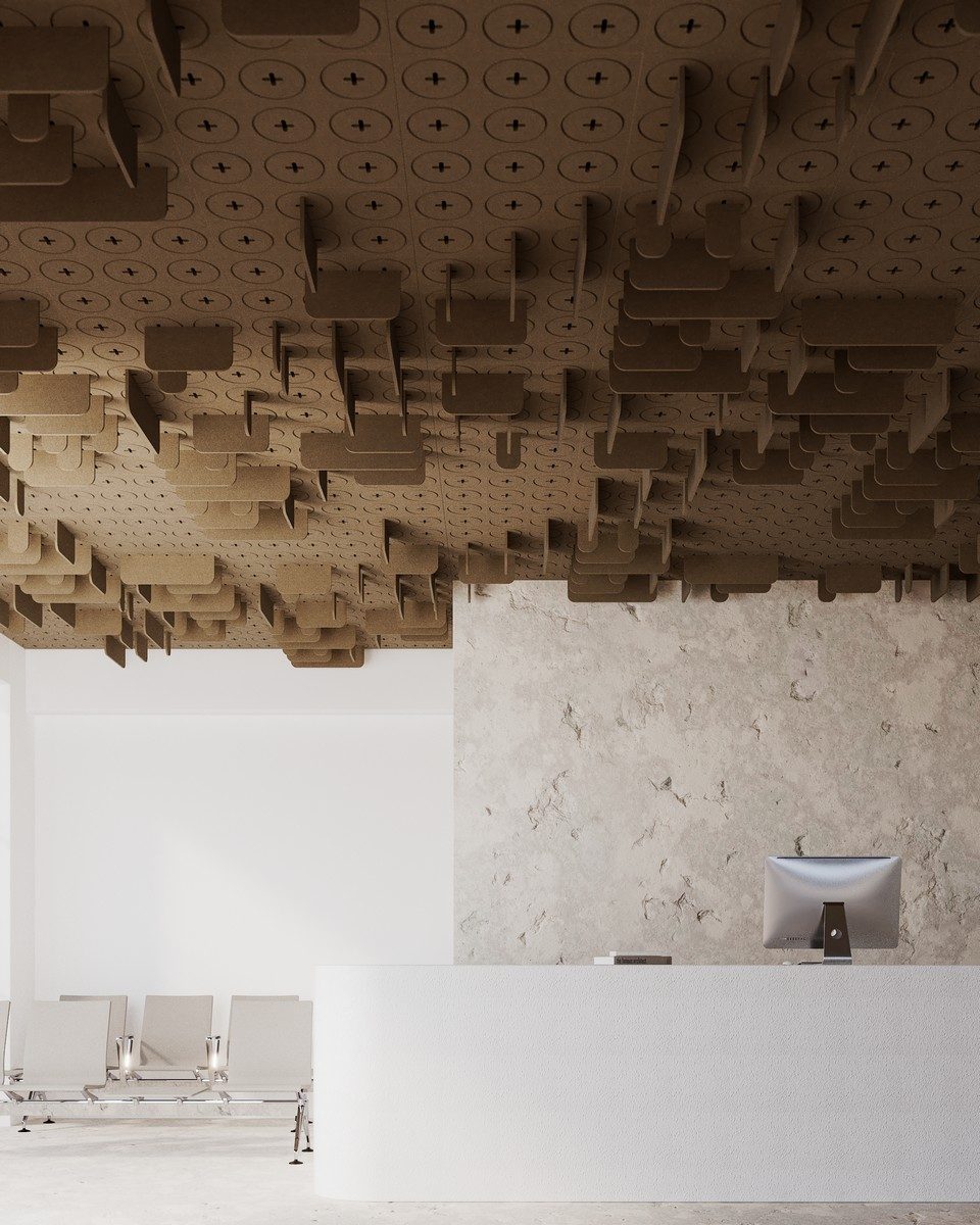 Les dalles NOVA à clipser au fond plafond habillent un hall d'immeuble tertiaire avec un aspect très architectural et une amélioration acoustique significative. La mise en place est rapide et facile à mettre en œuvre.