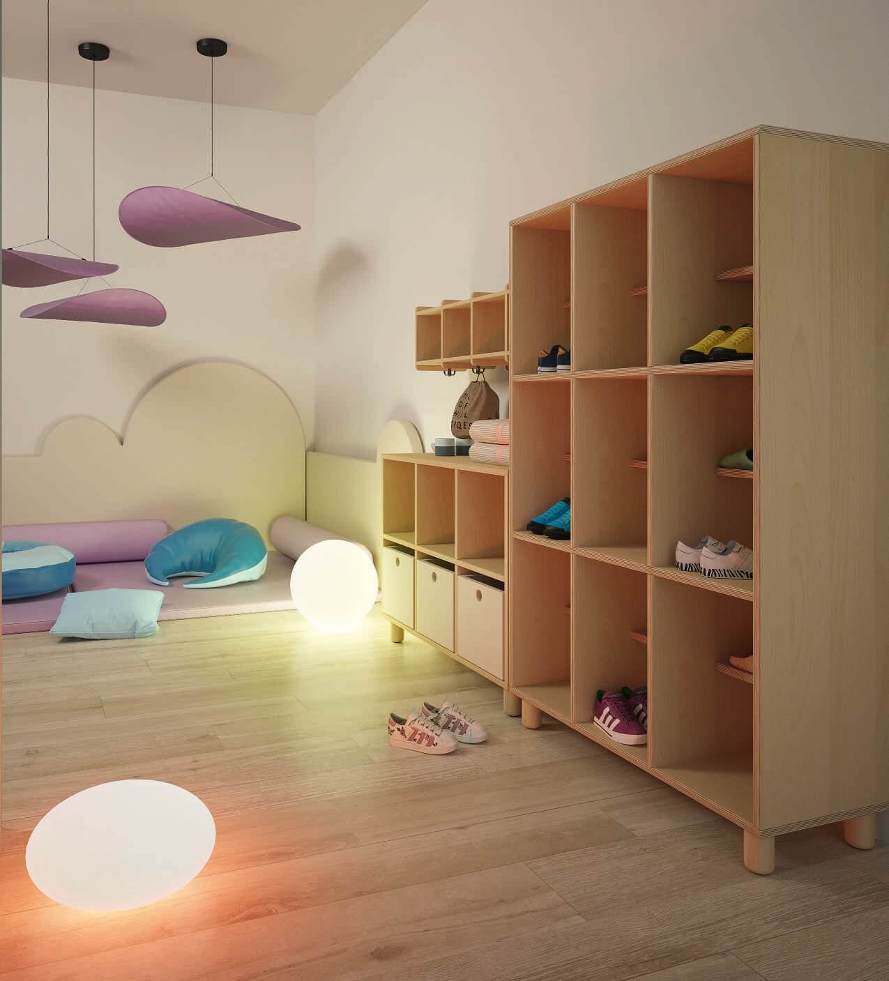 Meuble de rangement multifonction pour école de la petite enfance, dans un espace sieste polyvalent