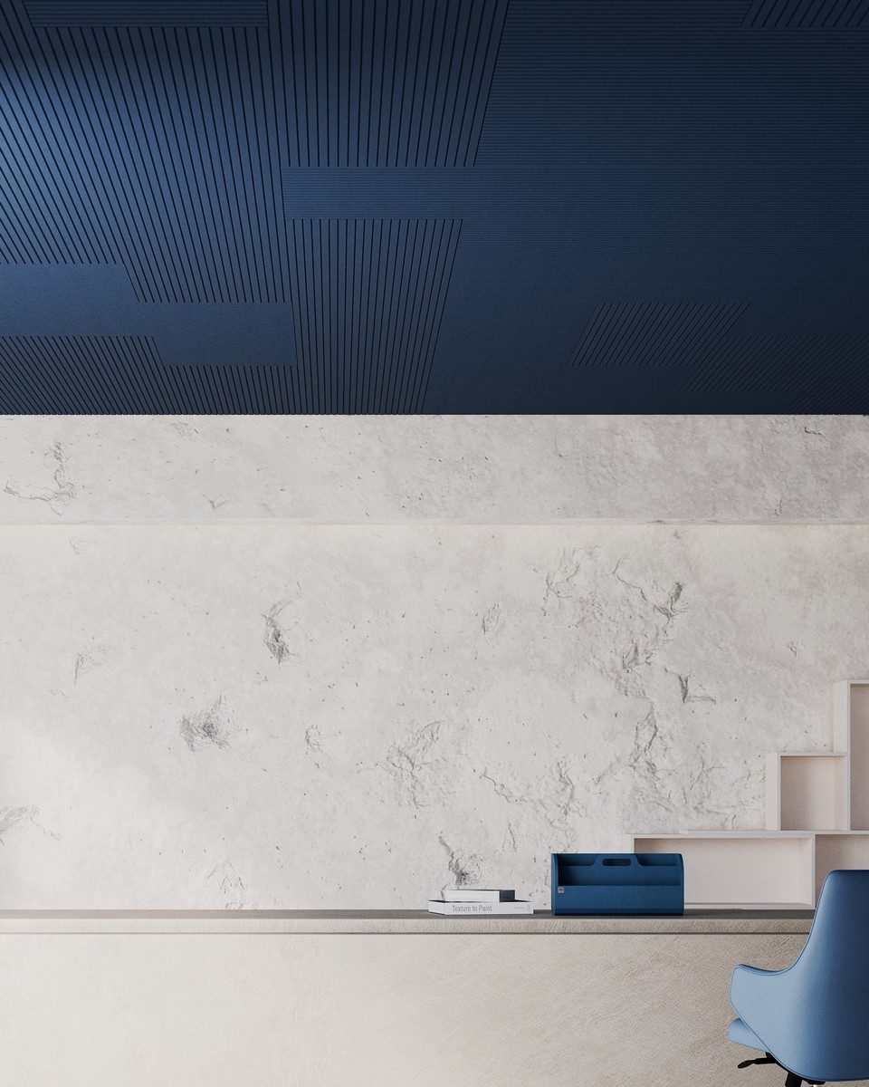 Un espace d'accueil dont le faux plafond a été entièrement masqué par les dalles acoustiques NOVA, un système à clipser simple à mettre en œuvre.