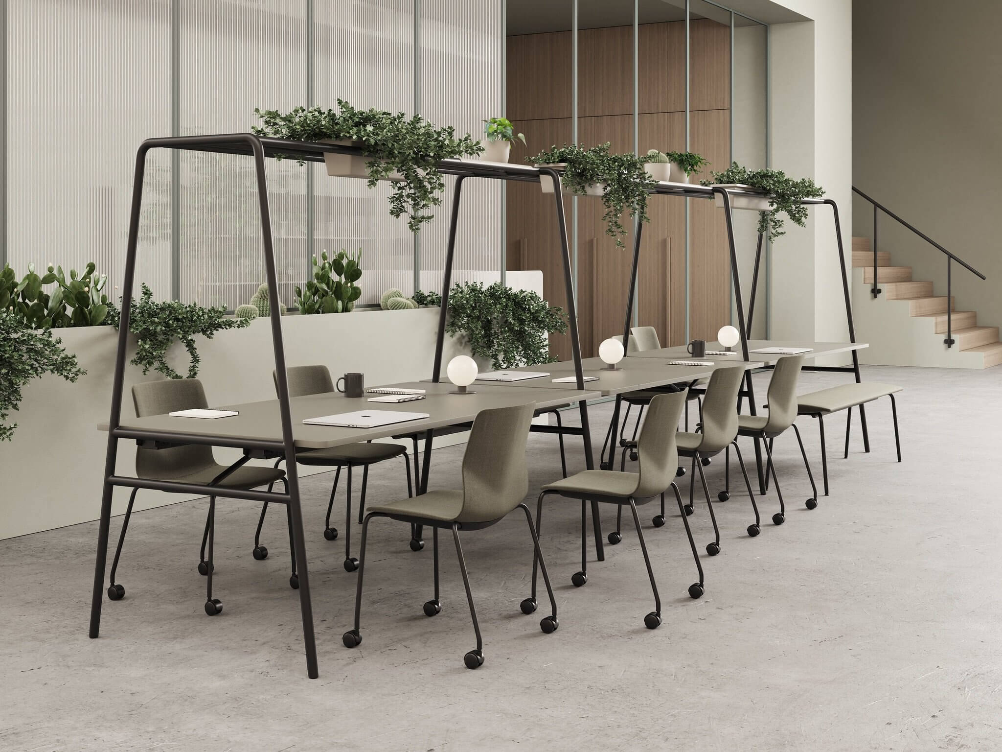 Table design ARCHE pour le coworking, avec jardinière de plantes intégrées.