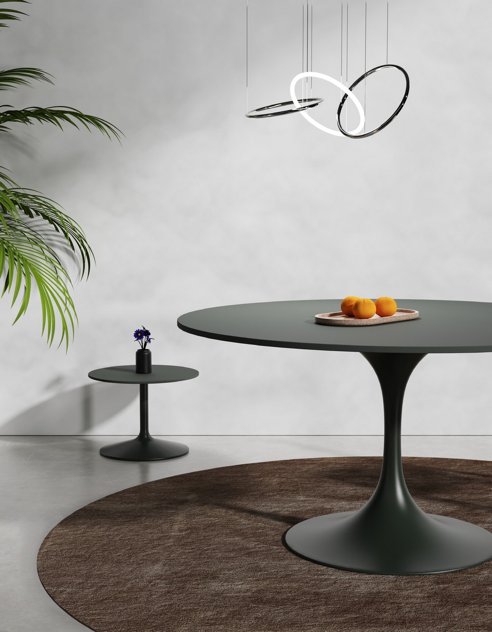 Comparaison du plus petit et du plus grand format de la table design BIG HORN, avec le pied tulipe iconique