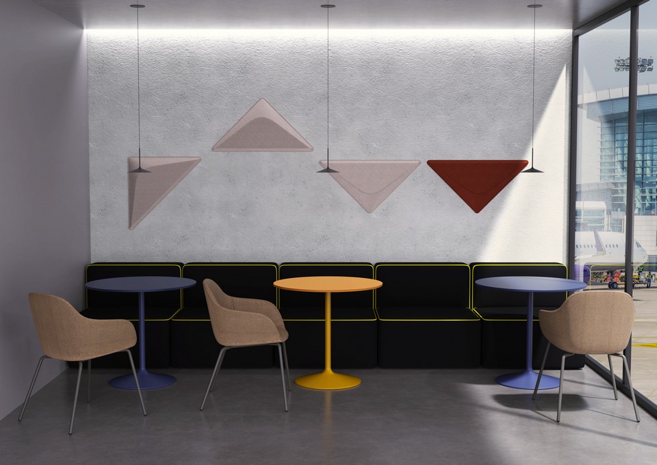 La table BIG HORN et son pied tulipe utilisé dans un espace repas, faisant démonstration des personnalisations possibles en matière de couleurs.