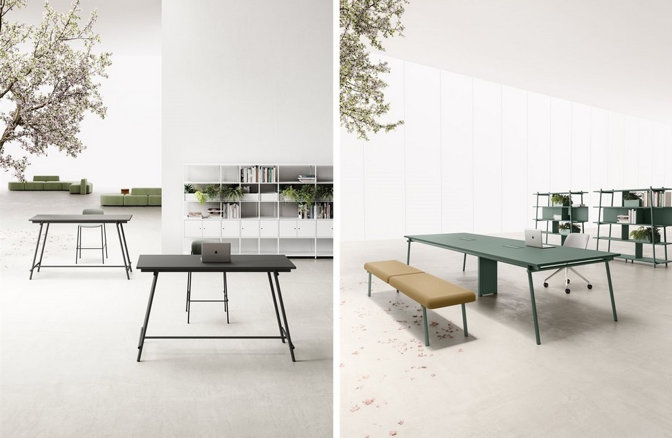Tables hautes noires pour travail debout et table de réunion verte accompagnée d'un banc design KNOT pour des échanges informels.