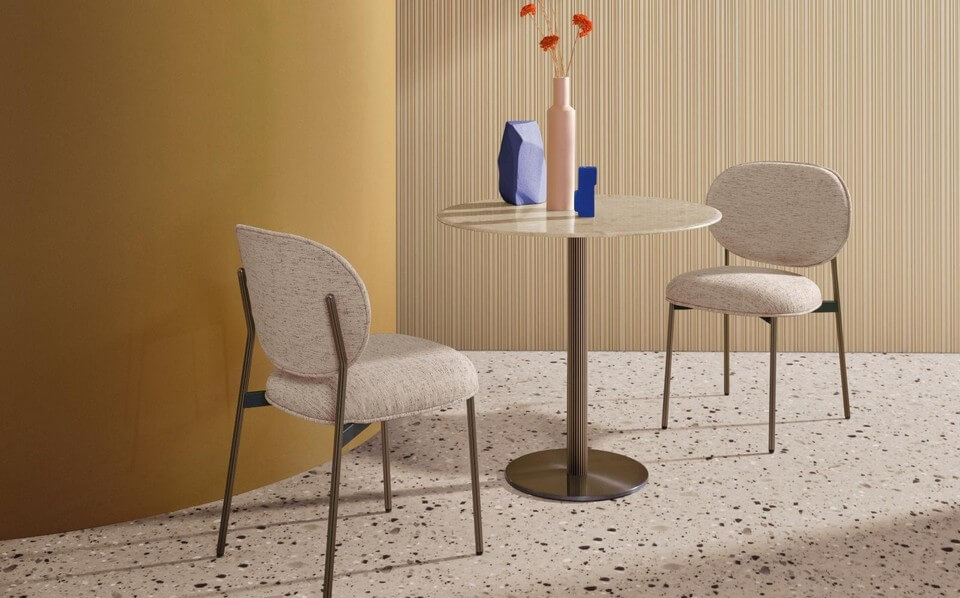 La table de restaurant BLUME propose une base centrale en acier rainuré, une solution design et élégante